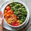 A balanced, vibrant bowl of healthy food, representing mindful eating and nutrition.